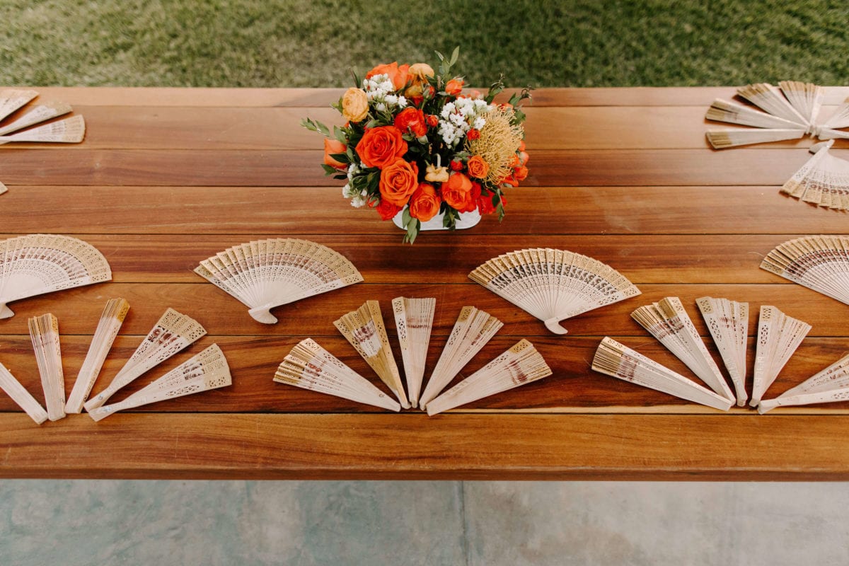 Boho Southwestern Wedding Details: wooden fans