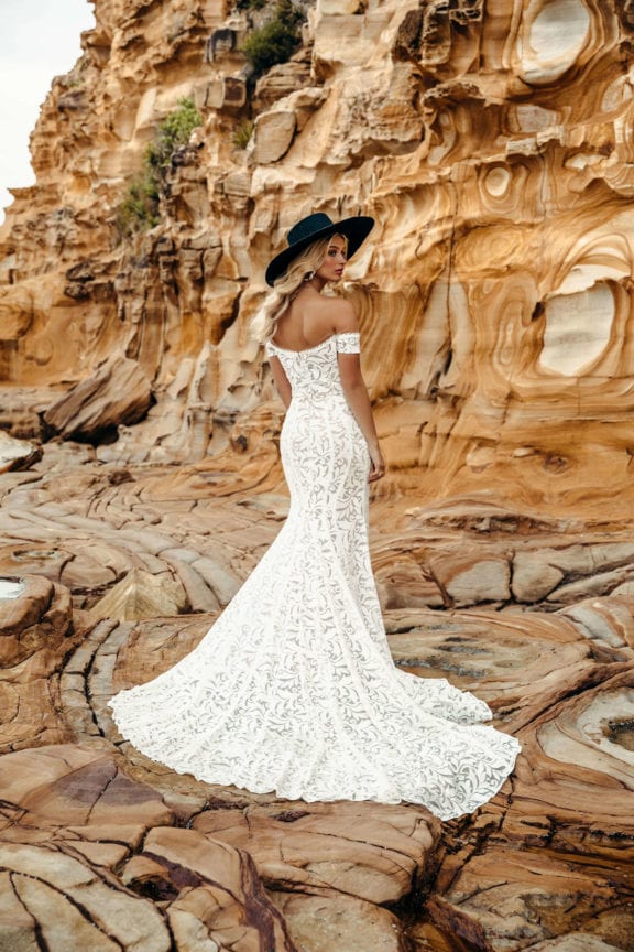lovers society indigo lace wedding dress with deep v neckline and side split